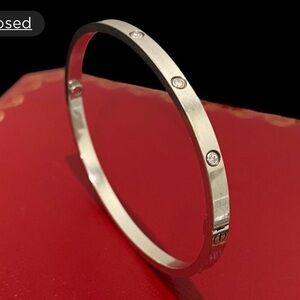 Cartier white gold love bracelet. Size 17. Small model. 10 diamonds. $10k retail